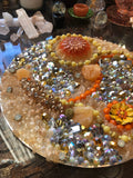 Load image into Gallery viewer, Crackled Orange Quartz and Yellow Calcite Rhinestone geode Mirror, Crystal Resin table art, Witch altarpiece