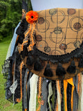 Load image into Gallery viewer, Embrace the Boho Vibe: Black and Orange Lace Fringe Purse, Hippie Handbag with Chic Embellishments!